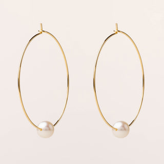 Orecchini a cerchio in argento 925 con perla naturale centrale