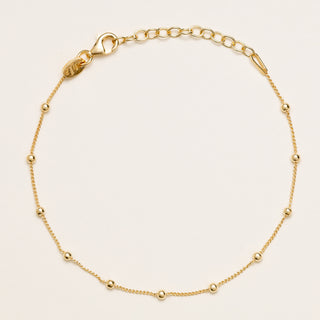 Bracciale in argento 925 placcato oro con sfere dorate distribuite lungo la catena