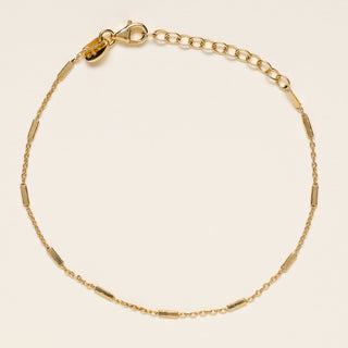 Bracciale regolabile in argento 925 placcato oro con barrette rettangolari distribuite lungo la catena