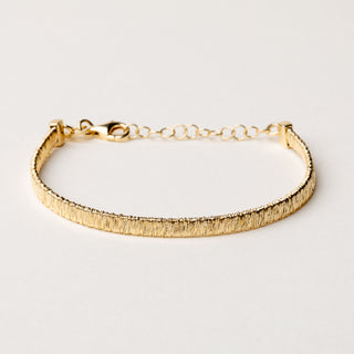 Bracciale statement morbido oro donna rigato 15,5+3 cm