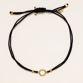 Bracciale cerchio oro cordino nero minimal
