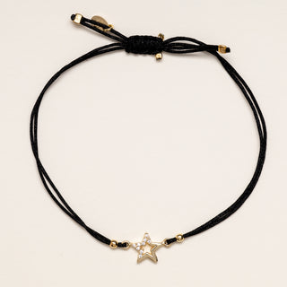 Bracciale stella oro cordino nero zirconi