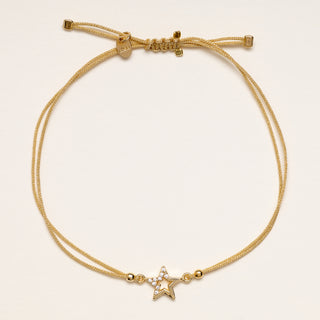 Bracciale stella oro cordino nero zirconi