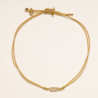Bracciale ovale oro zirconi cordino nero