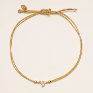 Bracciale zirconi cluster oro cordino nero
