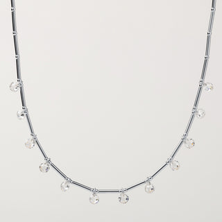 Collana in argento 925 placcato oro con zirconi pendenti lungo la catena tubolare