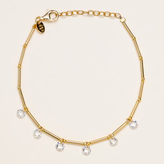 Bracciale in argento 925 placcato oro con zirconi pendenti lungo la catena tubolare