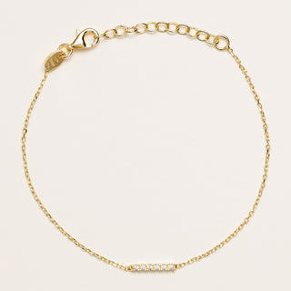 Bracciale sottile a catena con inserto a barretta luminosa di zirconi.