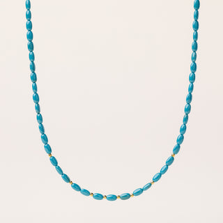 Collana in argento dorato impreziosita con pietra turchese naturale.