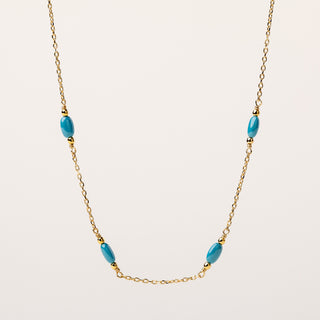 Collana girocollo in argento placcato oro impreziosita con turchese.