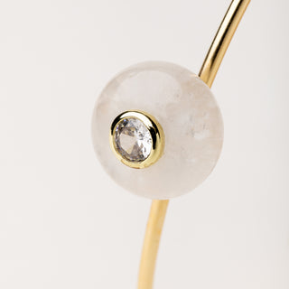 Bracciale rigido in argento dorato con pietra naturale e zircone.