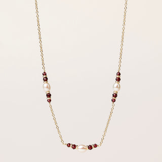 Collana in argento 925 dorato con granato naturale dal design geometrico essenziale.