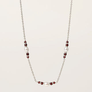 Collana in argento 925 Rodiato con granato naturale dal design geometrico essenziale.