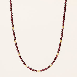 Collana in argento 925 dorato con granato naturale dal design geometrico essenziale.