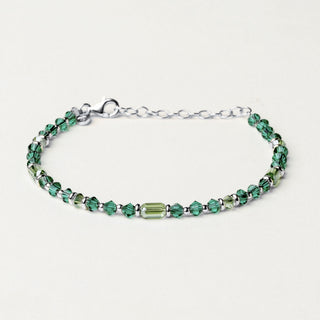 Bracciale in argento 925 Rodiato con cristallo verde dal design geometrico essenziale.