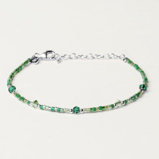 Bracciale in argento 925 Rodiato con miyuki dal design geometrico essenziale.