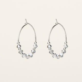 Orecchini in argento 925 Rodiato con cristallo ghiaccio dal design geometrico essenziale.