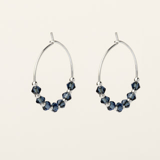 Orecchini in argento 925 Rodiato con cristallo ghiaccio dal design geometrico essenziale.