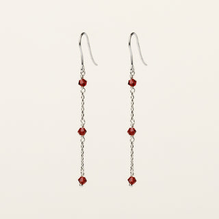 Orecchini in argento 925 Rodiato con cristallo rosso dal design geometrico essenziale.