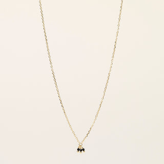 Collana in argento 925 dorato con spinello naturale dal design geometrico essenziale.