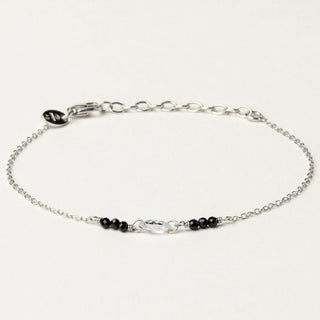 Bracciale in argento 925 Rodiato con spinello naturale dal design geometrico essenziale.