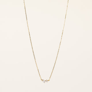 Collana catena in argento dorato con zirconi taglio goccia e tondo centrali.