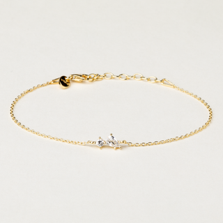 Bracciale catena in argento dorato con inserti in zircone a goccia e tondo.