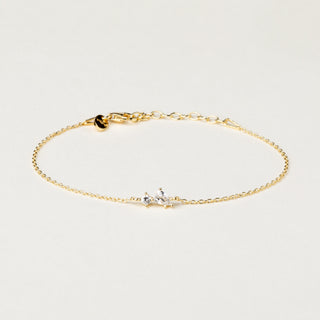 Bracciale catena in argento dorato con inserti in zircone a goccia e tondo.