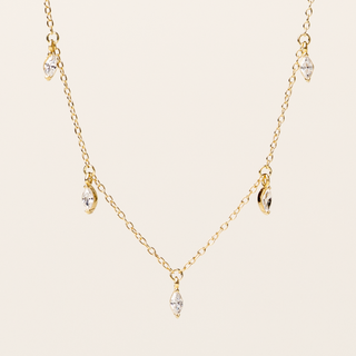 Collana in argento dorato con sequenza di 5 zirconi pendenti taglio marquise.