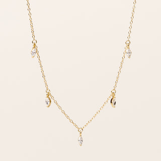 Collana in argento dorato con sequenza di 5 zirconi pendenti taglio marquise.