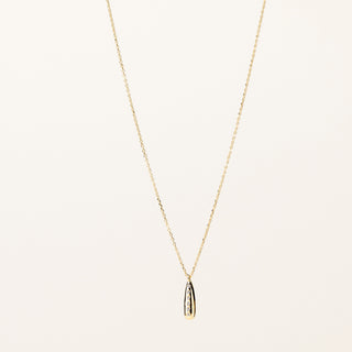 Collana in argento 925 dorato con zirconia dal design geometrico essenziale.