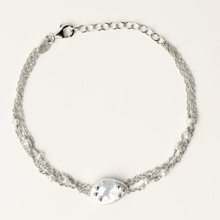 Bracciale in argento 925 Rodiato con perle d'acqua dolce dal design geometrico essenziale.