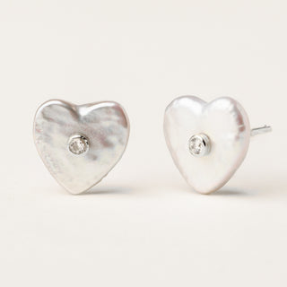 Orecchini in argento 925 Rodiato con perle d'acqua dolce dal design geometrico essenziale.