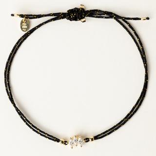 Bracciale a filo regolabile con elemento centrale in zirconi taglio marquise.