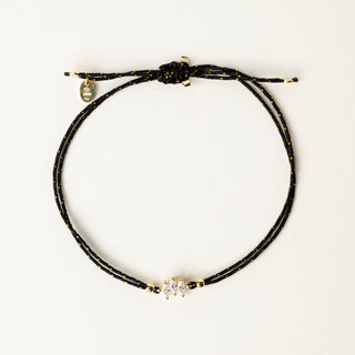 Bracciale a filo regolabile con elemento centrale in zirconi taglio marquise.